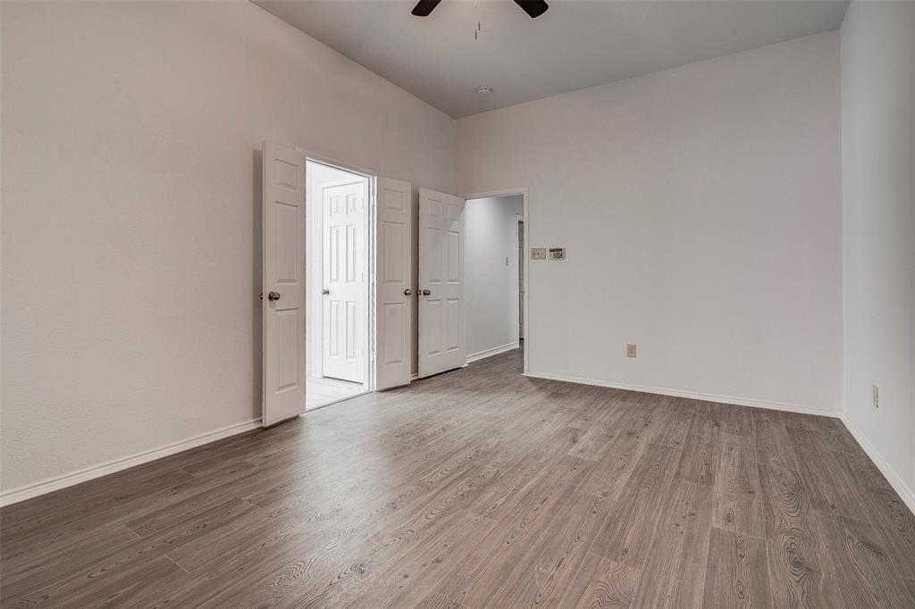 815 Fairlawn Street Allen, TX 75002 - Photo 14 of 22 a view of a room with wooden floor
