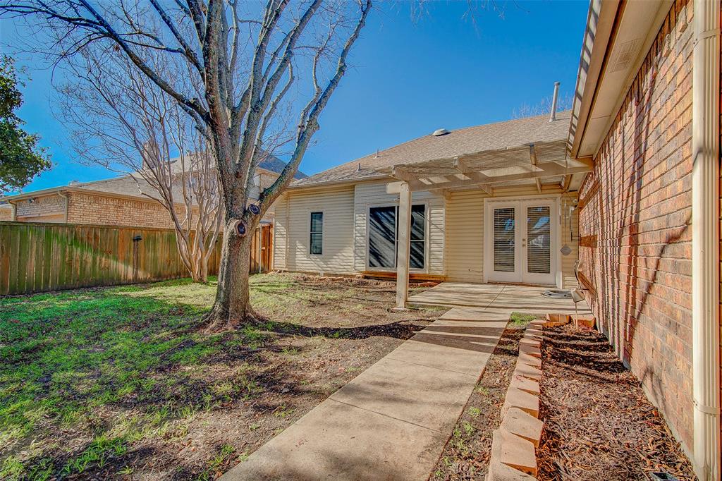 815 Fairlawn Street Allen, TX 75002 - Photo 20 of 22 a front view of a house with garden