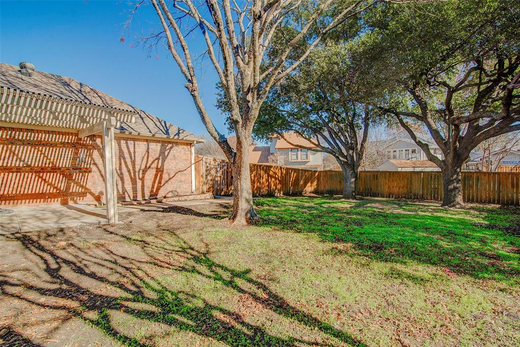 815 Fairlawn Street Allen, TX 75002 - Photo 22 of 22 a view of a house with a yard