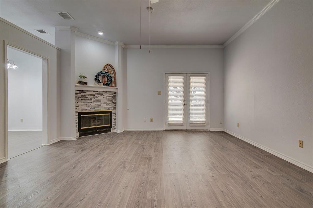 815 Fairlawn Street Allen, TX 75002 - Photo 3 of 22 wooden floor in an empty room