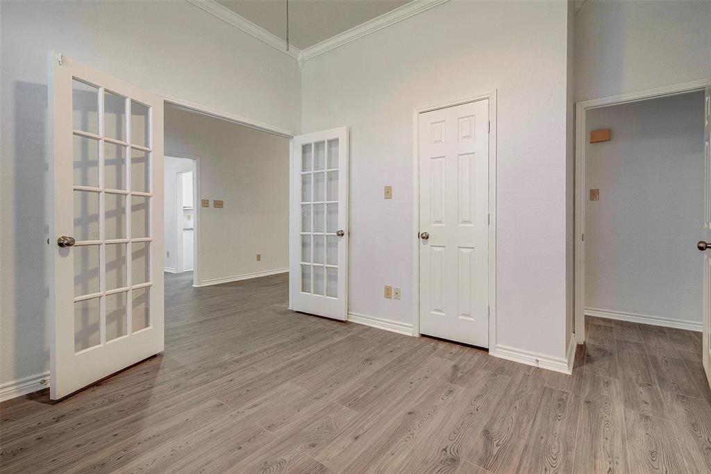 815 Fairlawn Street Allen, TX 75002 - Photo 8 of 22 wooden floor with white walls