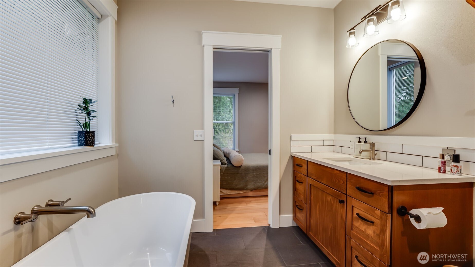 18620 Southeast 216th Street Renton, WA 98058 - Photo 20 of 28 a bathroom with a double vanity sink and a mirror