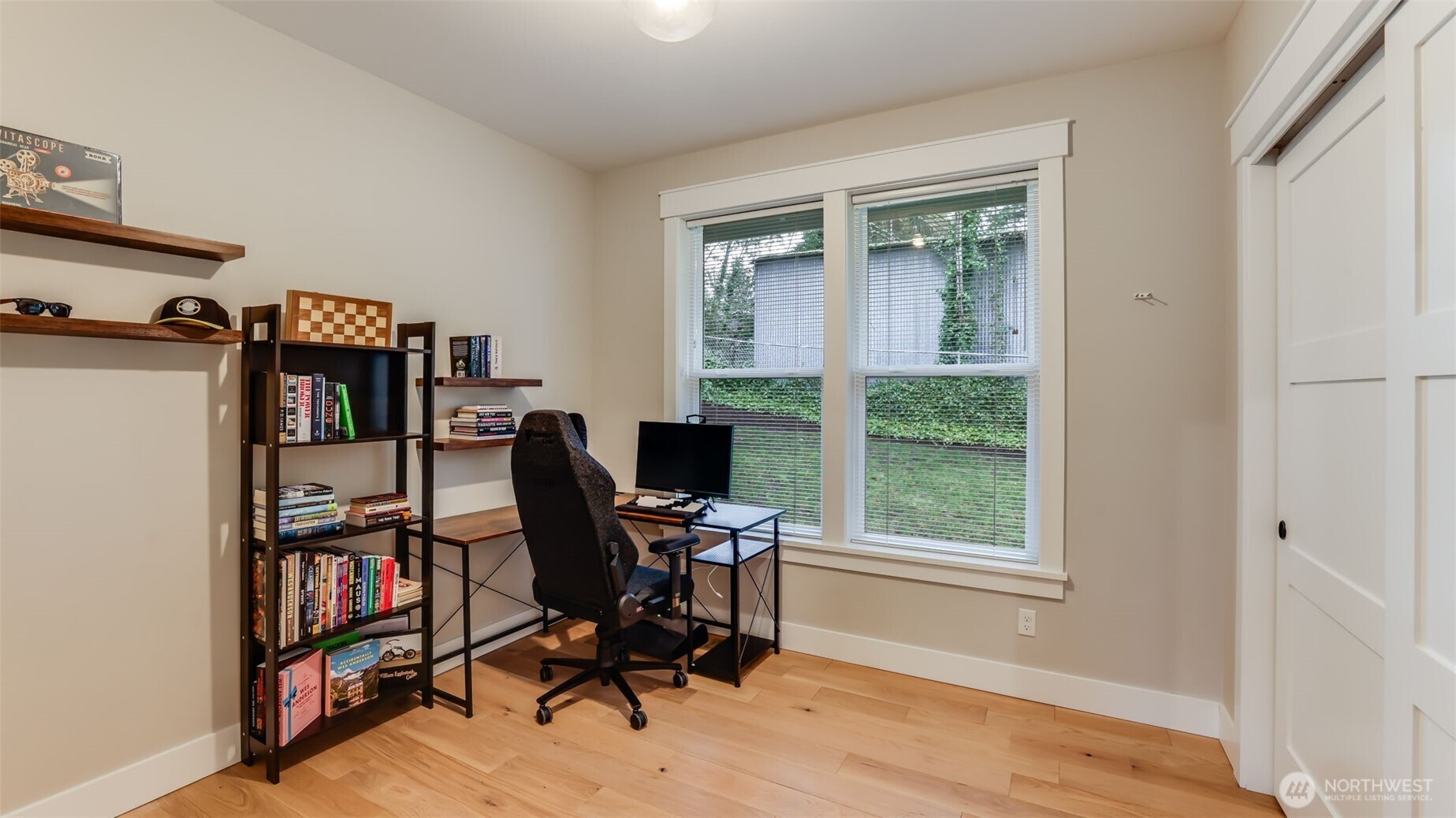 18620 Southeast 216th Street Renton, WA 98058 - Photo 22 of 28 a view of a workspace with furniture and a window