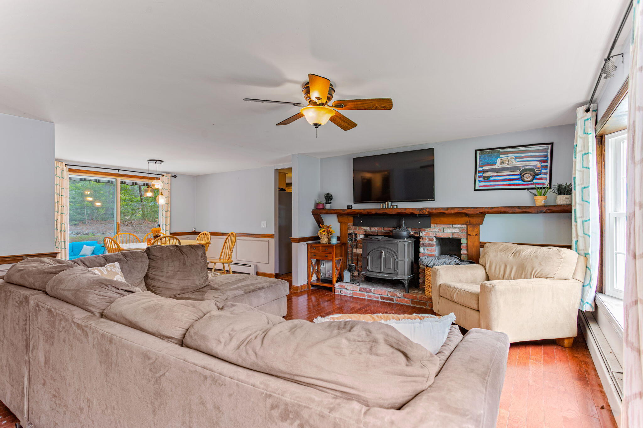 23 Meredith Road Forestdale, MA 02644 - Photo 11 of 22 a living room with furniture and a flat screen tv with wooden floor