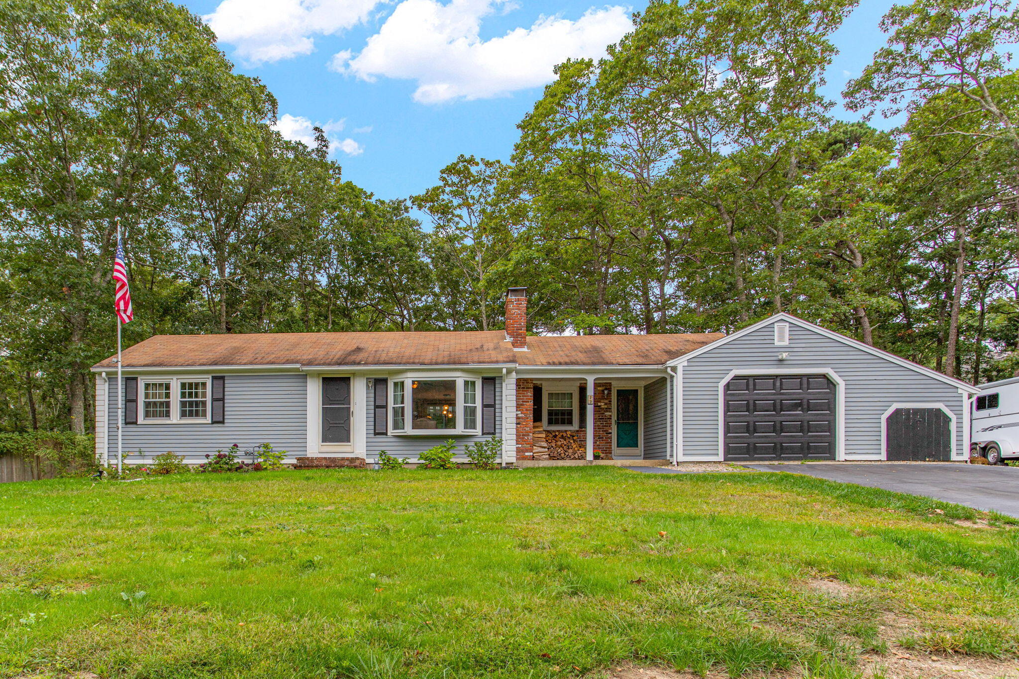 23 Meredith Road Forestdale, MA 02644 - Photo 19 of 22 a front view of a house with a garden