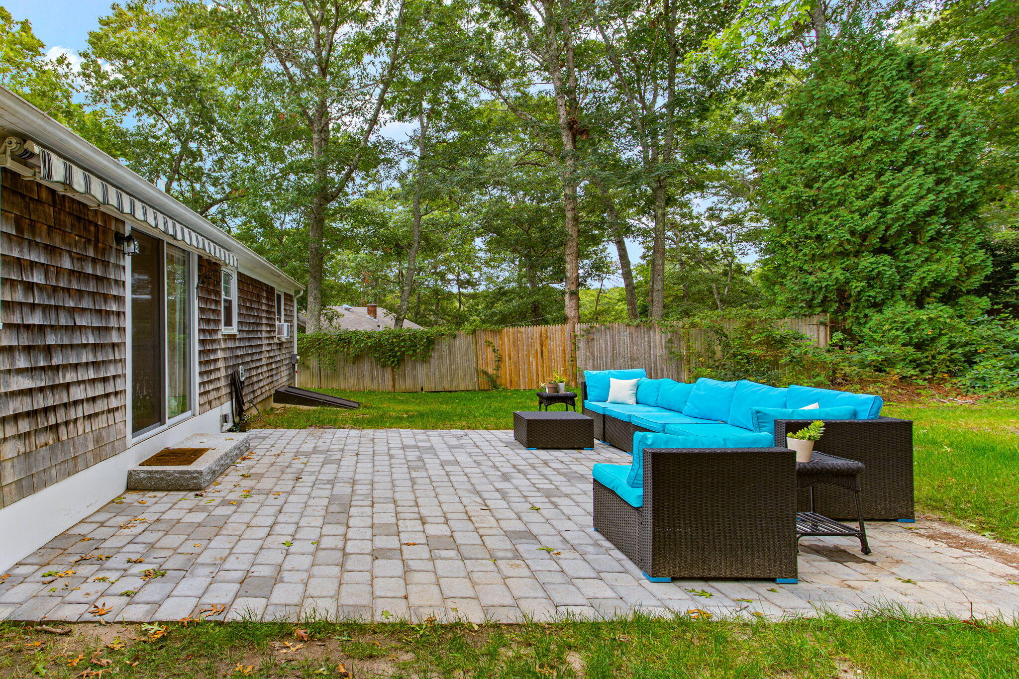 23 Meredith Road Forestdale, MA 02644 - Photo 20 of 22 a view of a yard with plants and a table and chairs