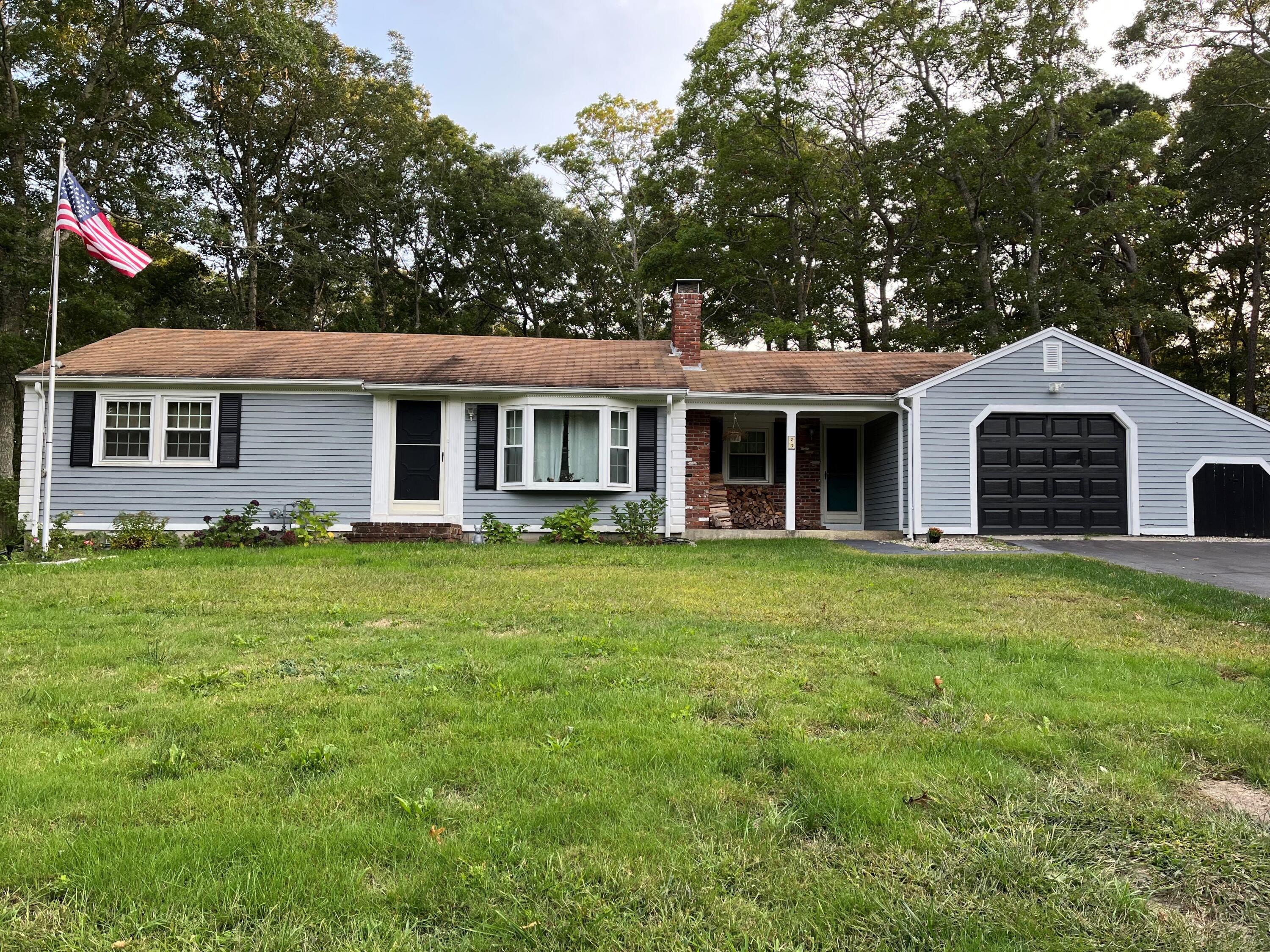 23 Meredith Road Forestdale, MA 02644 - Photo 2 of 22 a front view of a house with a garden