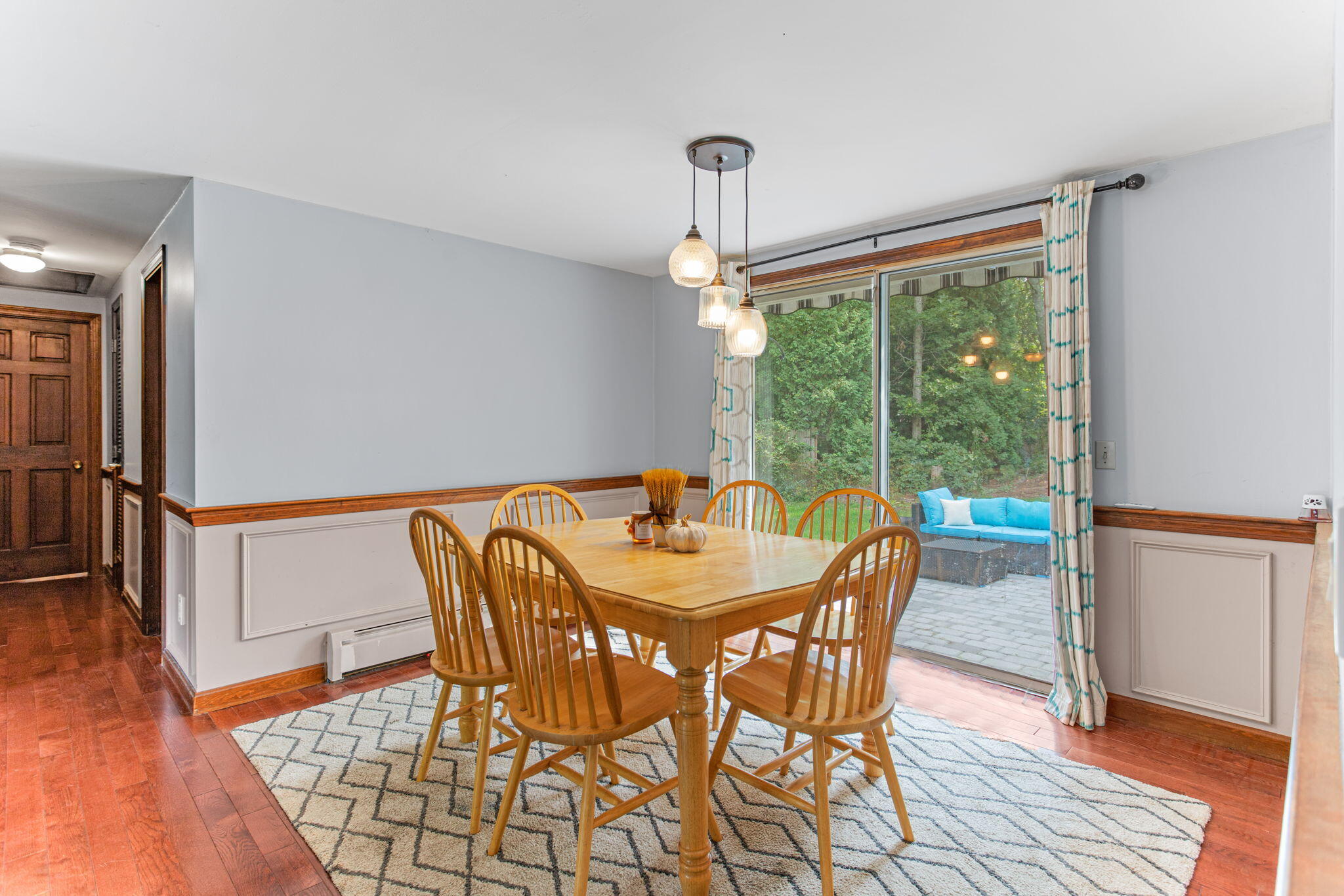 23 Meredith Road Forestdale, MA 02644 - Photo 9 of 22 a dining room with furniture a chandelier and wooden floor