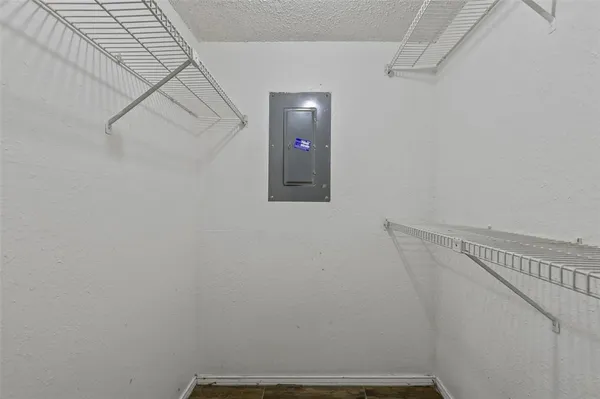 a view of a hallway with staircase