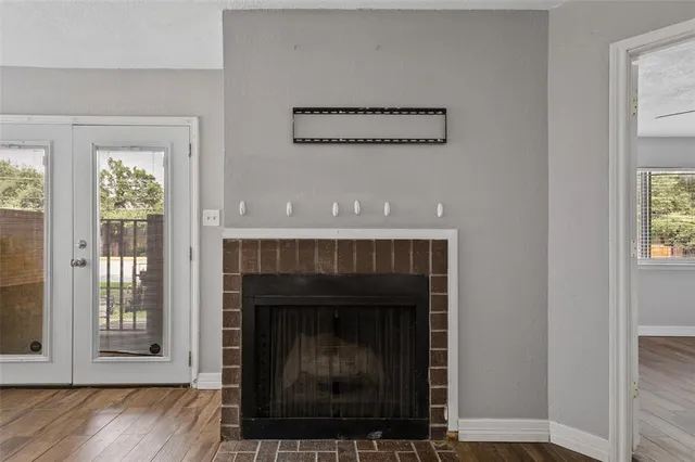 a living room with a fireplace