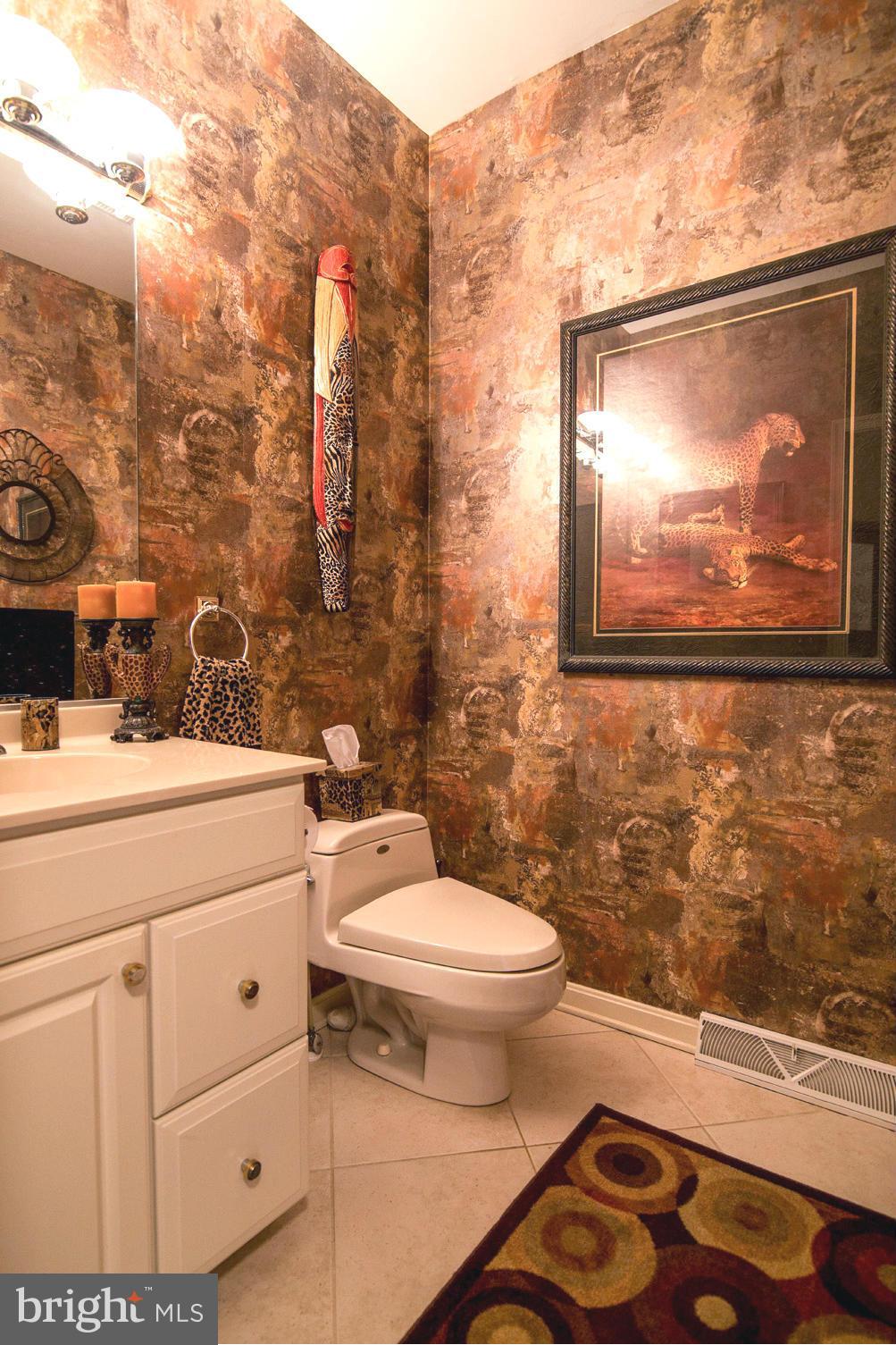 16511 York Road Monkton, MD 21111 - Photo 14 of 30 a bathroom with a toilet sink and mirror