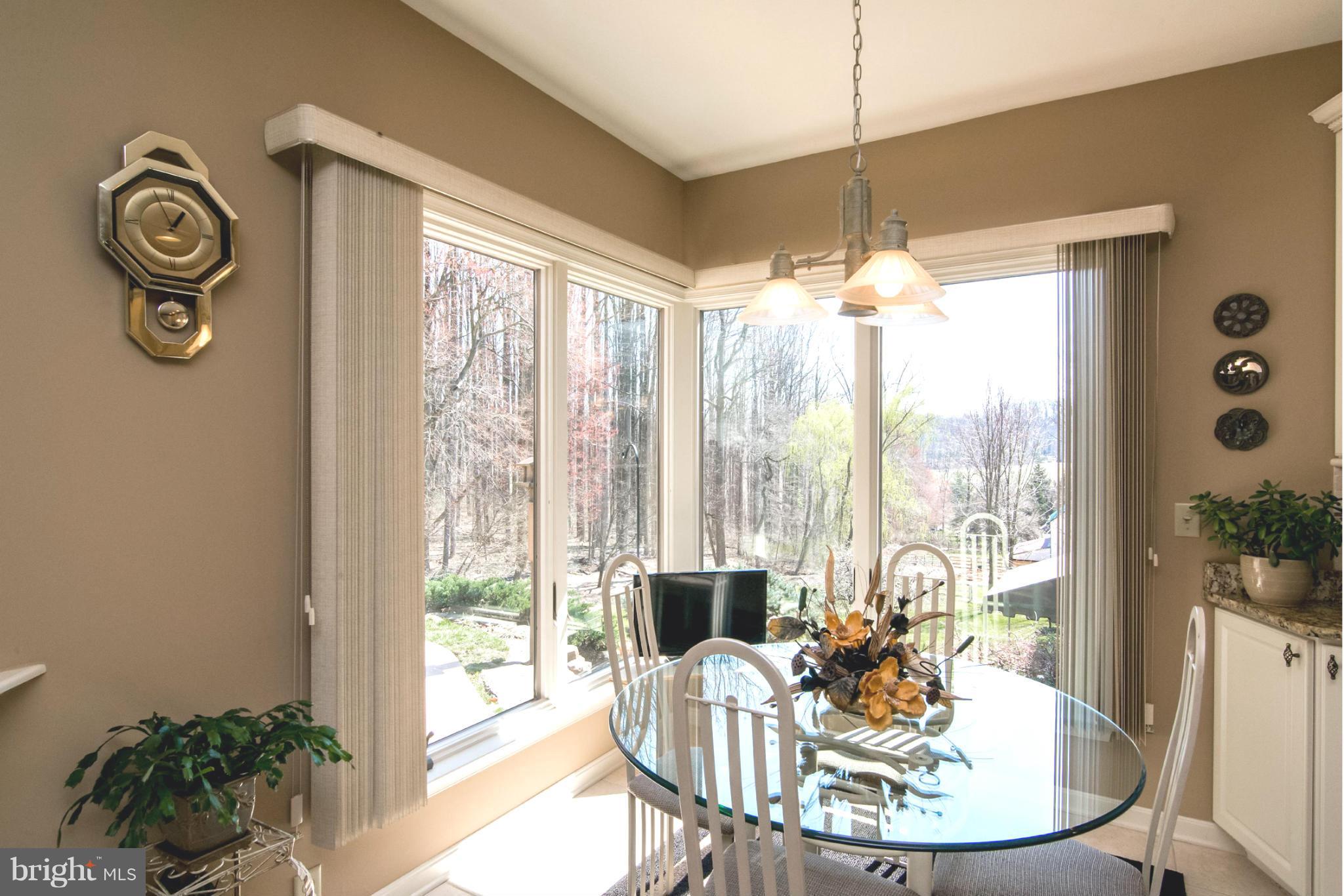16511 York Road Monkton, MD 21111 - Photo 19 of 30 a dining room with furniture a chandelier and wooden floor