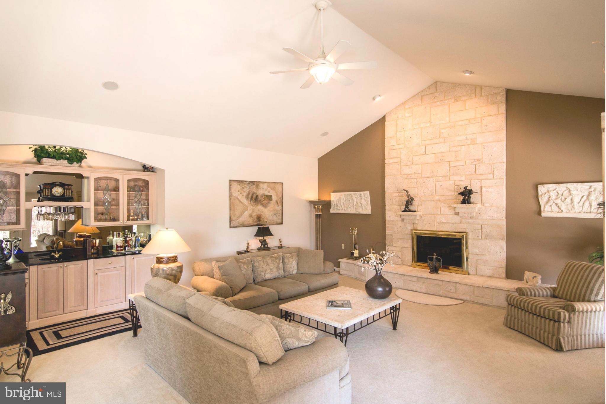 16511 York Road Monkton, MD 21111 - Photo 20 of 30 a living room with furniture and a fireplace