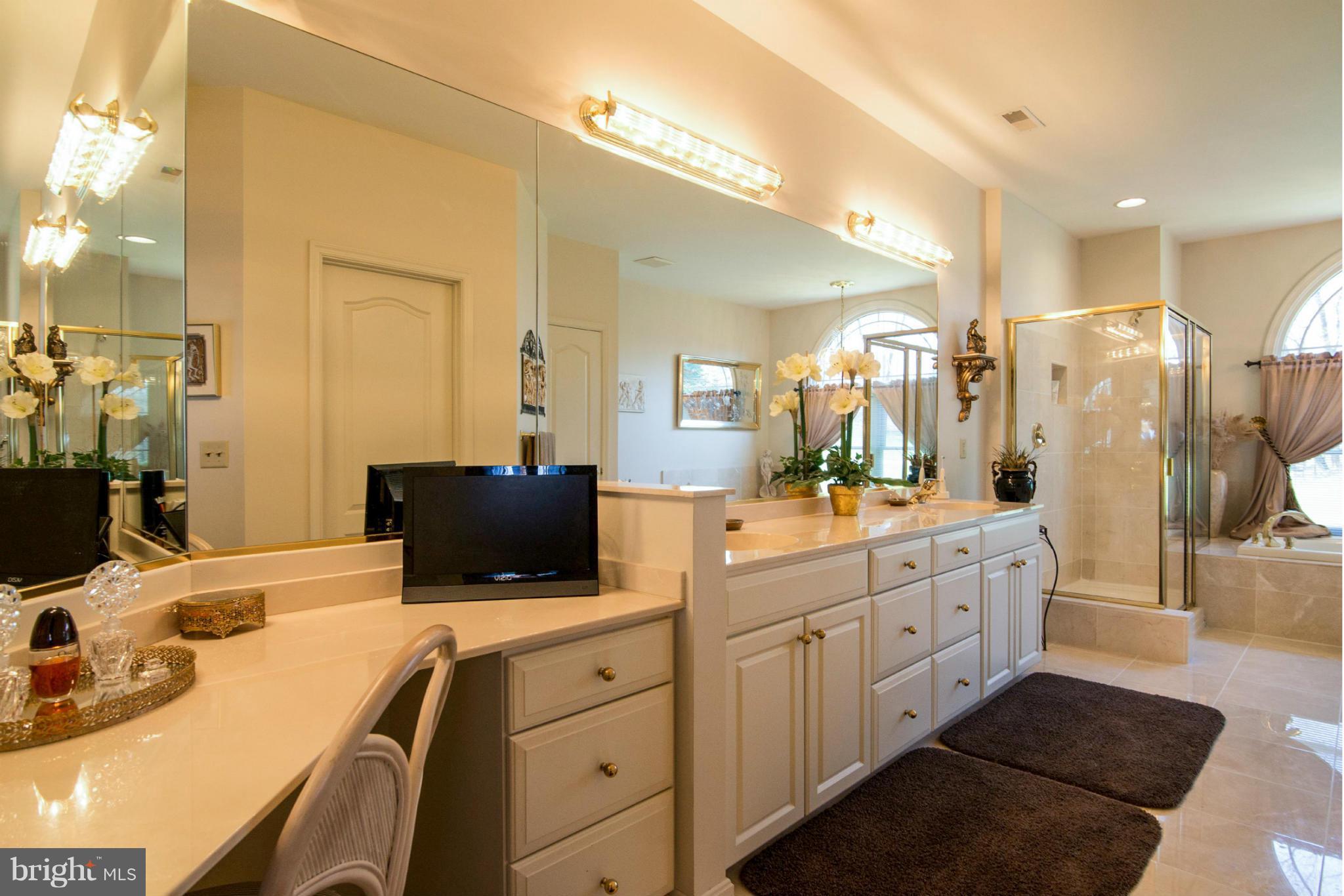 16511 York Road Monkton, MD 21111 - Photo 23 of 30 a bathroom with a sink double vanity granite and a large mirror