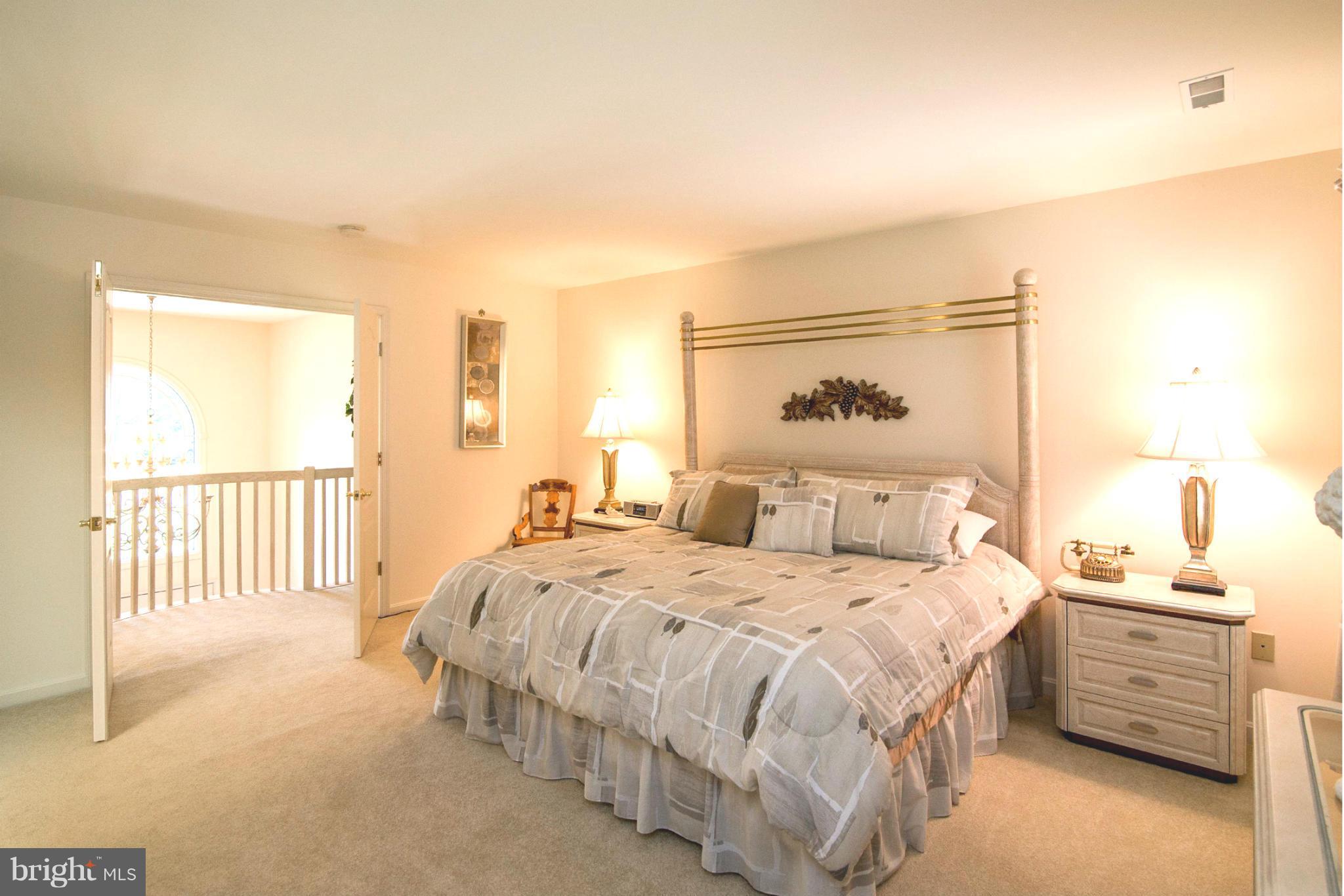 16511 York Road Monkton, MD 21111 - Photo 24 of 30 a bedroom with a bed and a night stand