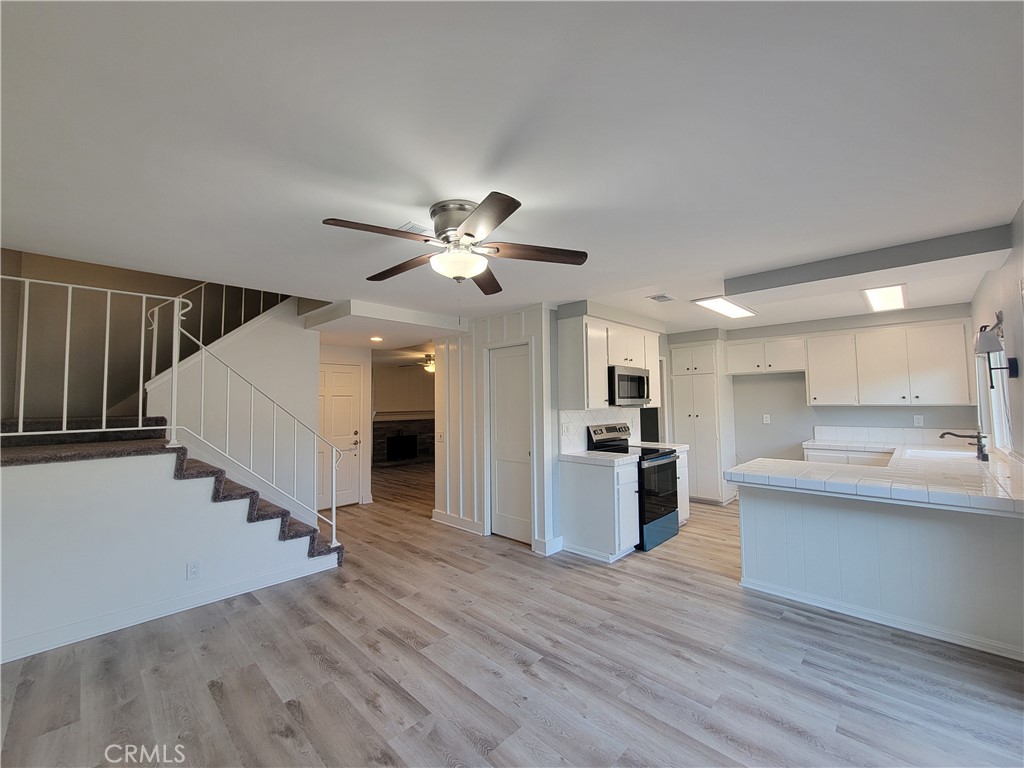 14325 Blackpool Road Westminster, CA 92683 - Photo 9 of 28 a view of kitchen with sink and refrigerator