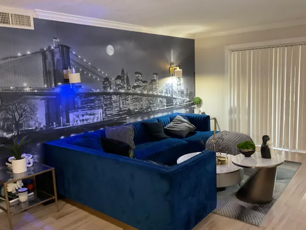 a living room with furniture and a table