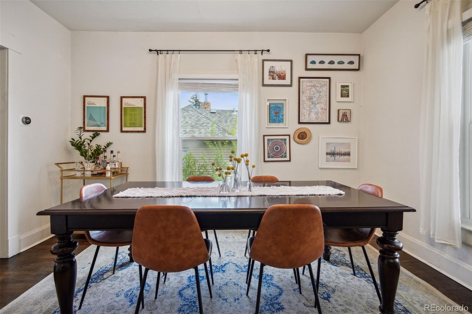 60 Perry Street Denver, CO 80219 - Photo 13 of 43 a dining room with furniture and window