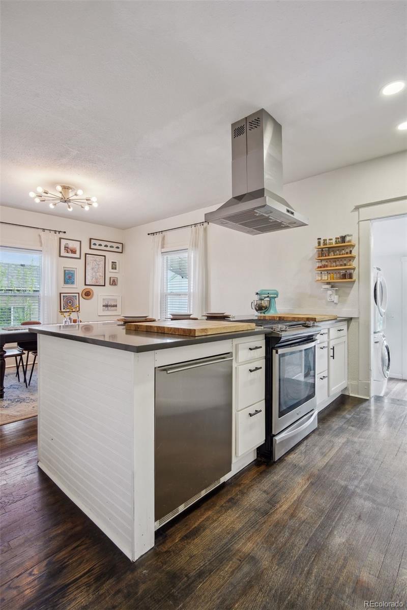 60 Perry Street Denver, CO 80219 - Photo 16 of 43 a kitchen with stainless steel appliances a sink and a stove