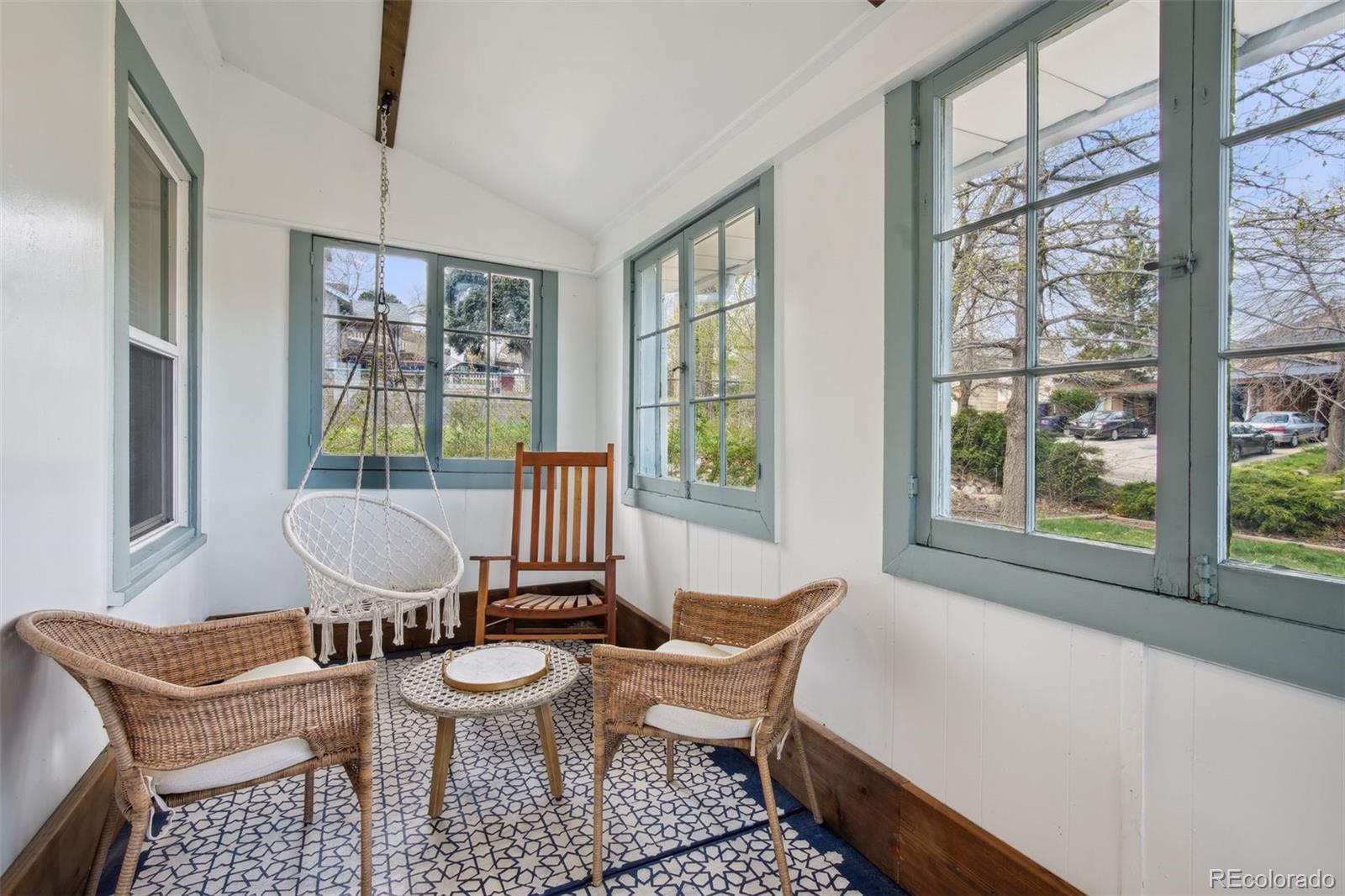 60 Perry Street Denver, CO 80219 - Photo 5 of 43 a living room with furniture and a window