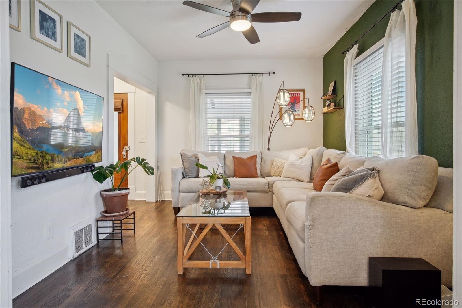 60 Perry Street Denver, CO 80219 - Photo 9 of 43 a living room with furniture and a flat screen tv
