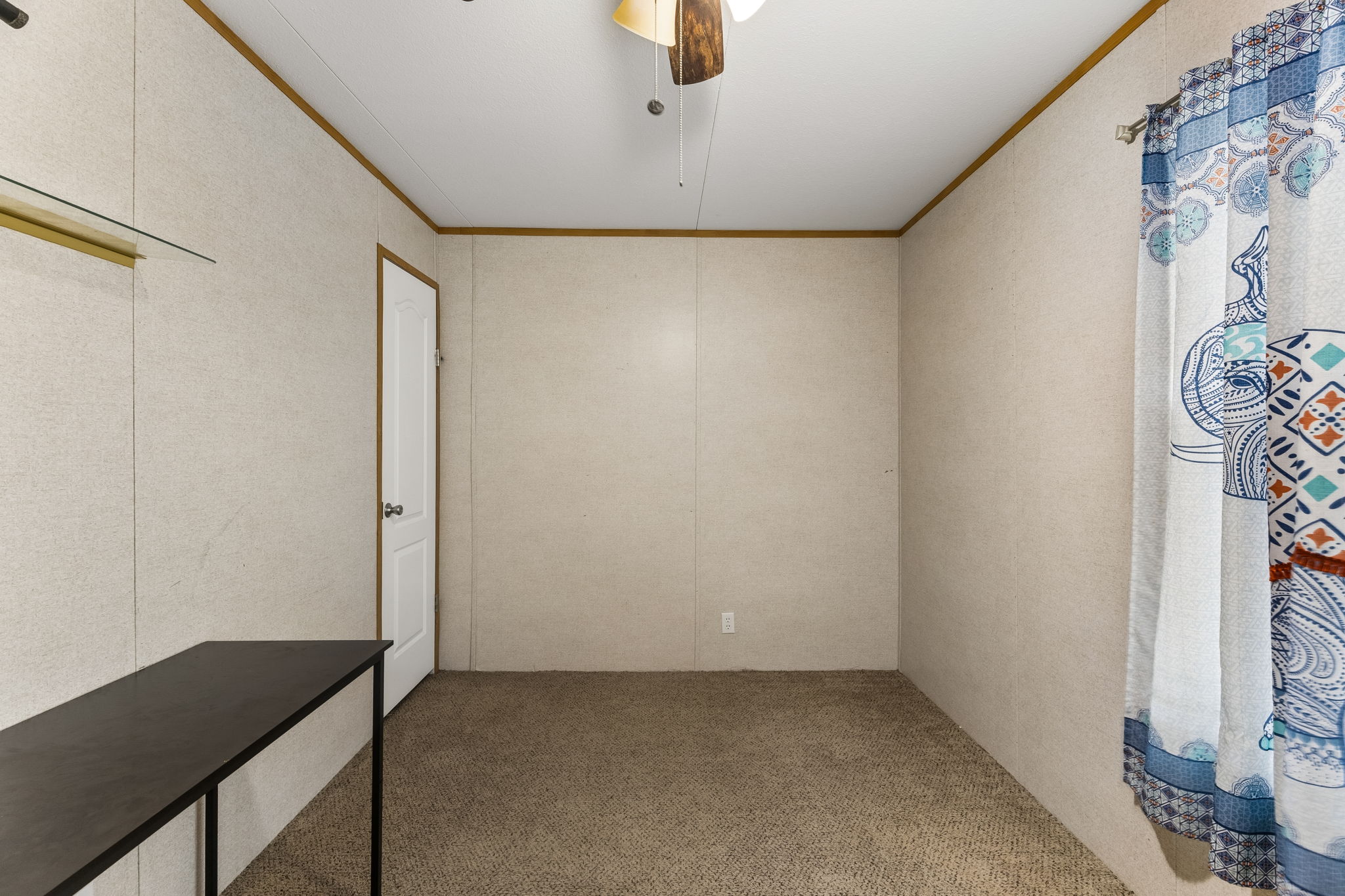 253 North County Line Road, Unit C Elgin, TX 78621 - Photo 21 of 39 Functional layout with warm carpet flooring, awaiting your personal touch and design.