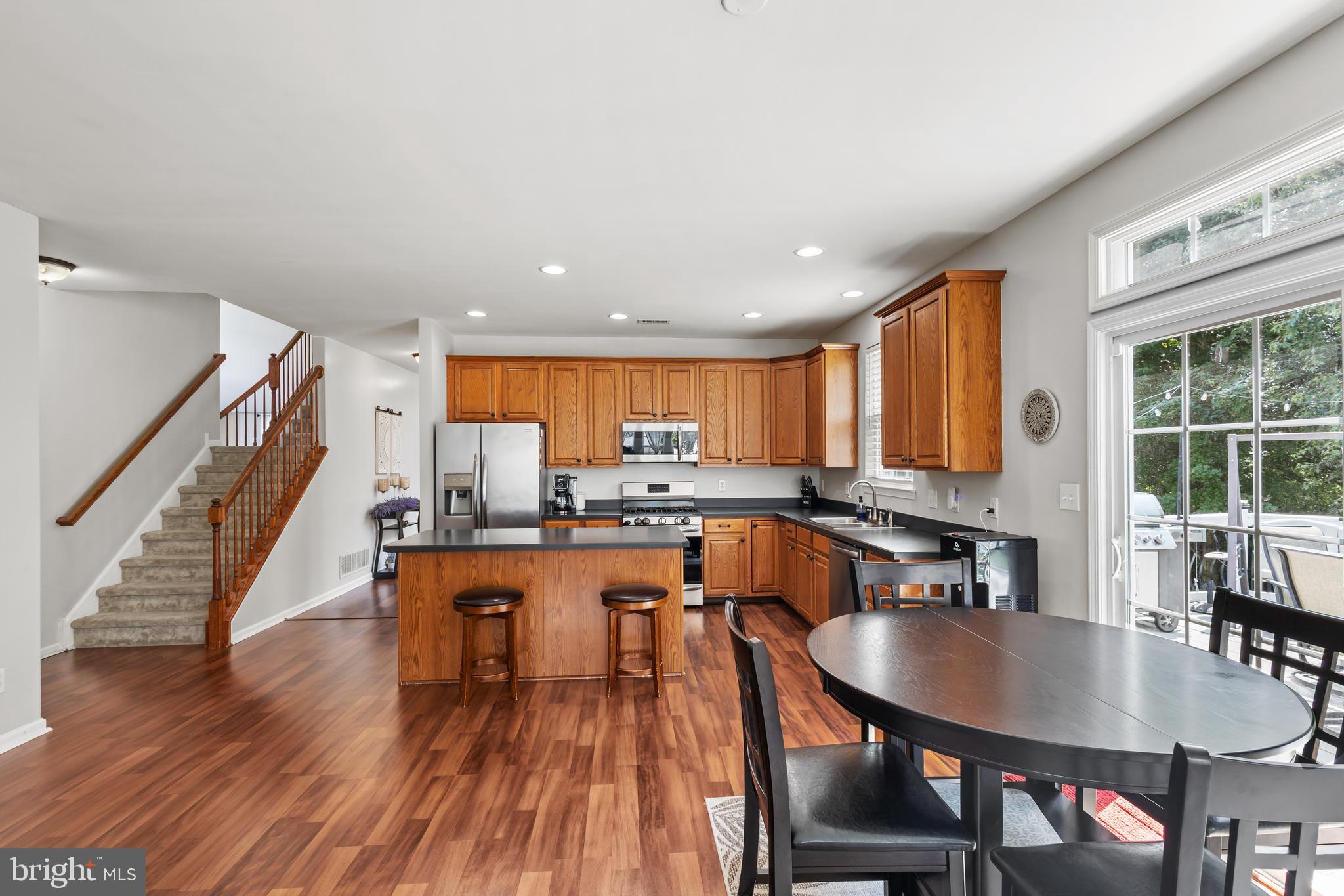 2603 Valhalla Road Vineland, NJ 08361 - Photo 11 of 43 a view of a dining room with furniture window and wooden floor