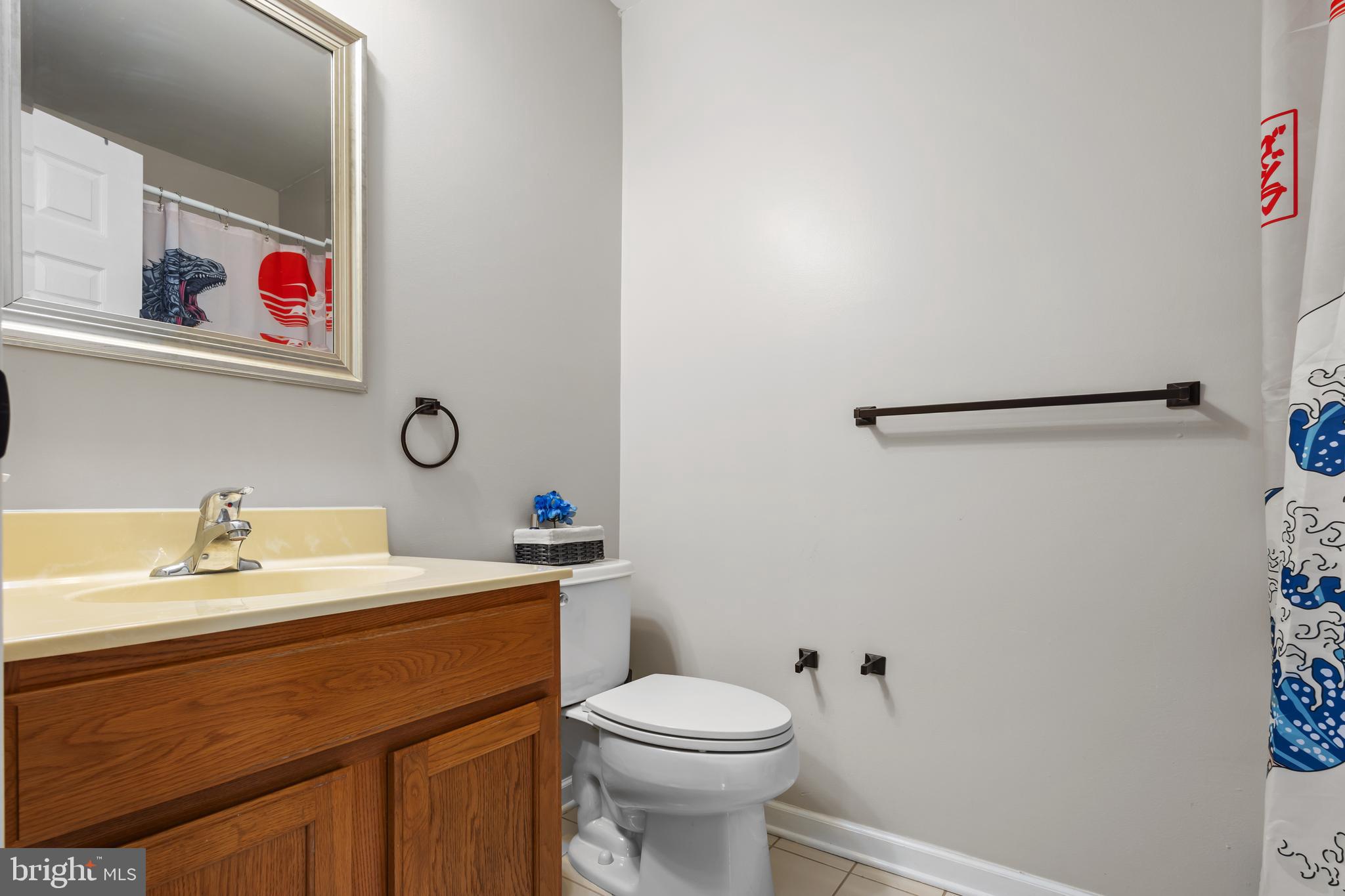 2603 Valhalla Road Vineland, NJ 08361 - Photo 26 of 43 a bathroom with a sink mirror vanity and toilet