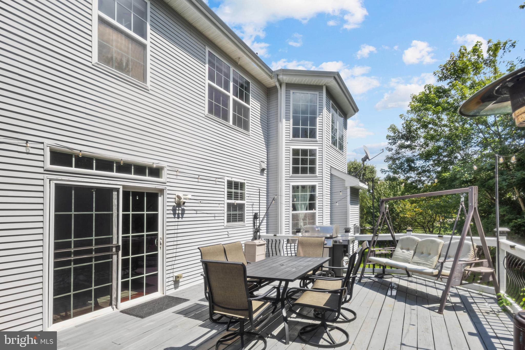 2603 Valhalla Road Vineland, NJ 08361 - Photo 41 of 43 a view of a patio with a table and chairs