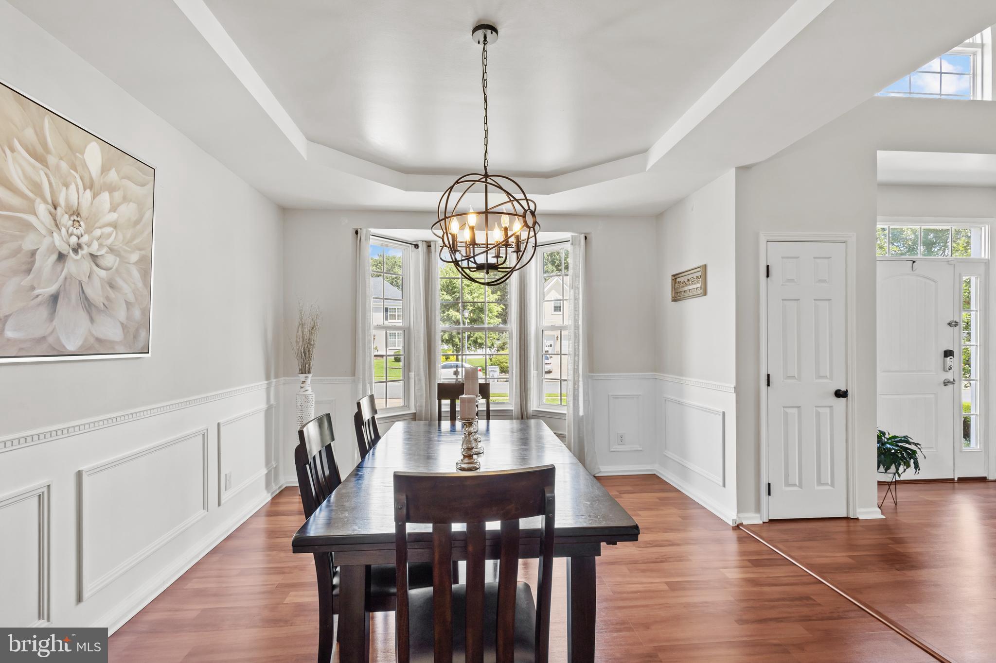 2603 Valhalla Road Vineland, NJ 08361 - Photo 8 of 43 a view of a dining room with furniture window and wooden floor