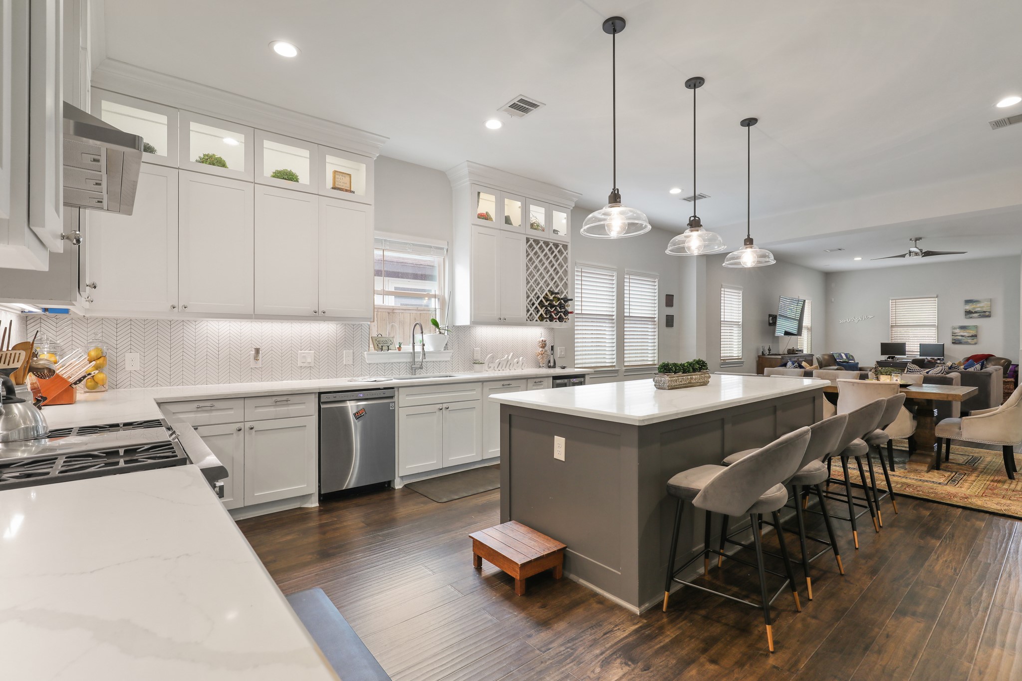 913 Eleanor Street Houston, TX 77009 - Photo 6 of 21 Another view of the kitchen with plenty of cabinets space, wine racks and wine fridge.