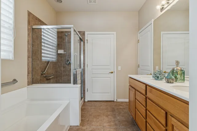 a bathroom with a bathtub and a sink