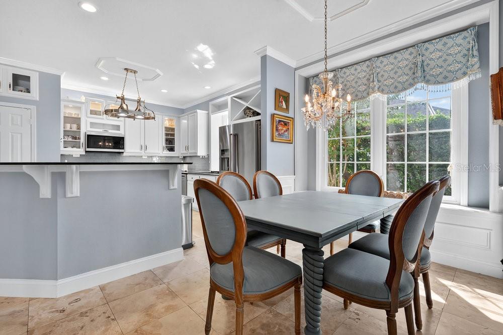 8375 Bowden Way Windermere, FL 34786 - Photo 12 of 62 a view of a dining room with furniture window and outside view