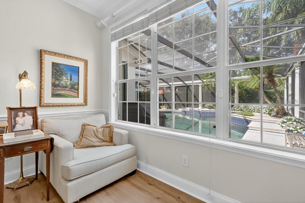 8375 Bowden Way Windermere, FL 34786 - Photo 23 of 62 a living room with furniture and a large window