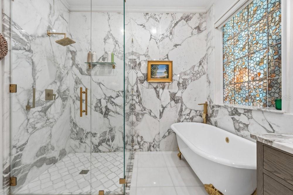 8375 Bowden Way Windermere, FL 34786 - Photo 25 of 62 a bathroom with a bathtub and shower