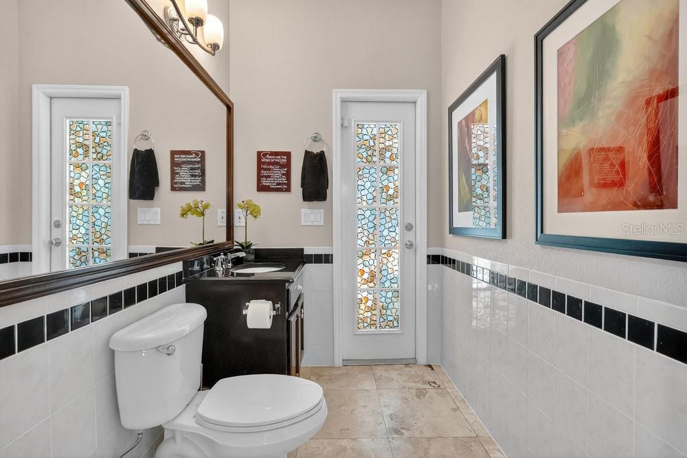 8375 Bowden Way Windermere, FL 34786 - Photo 27 of 62 a bathroom with a toilet a sink and a window