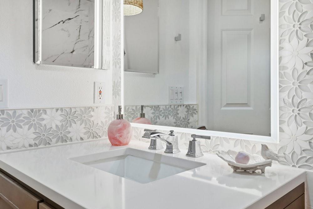 8375 Bowden Way Windermere, FL 34786 - Photo 29 of 62 a bathroom with a sink and a mirror