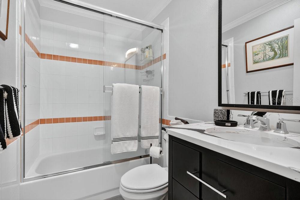 8375 Bowden Way Windermere, FL 34786 - Photo 37 of 62 a bathroom with a sink toilet and shower