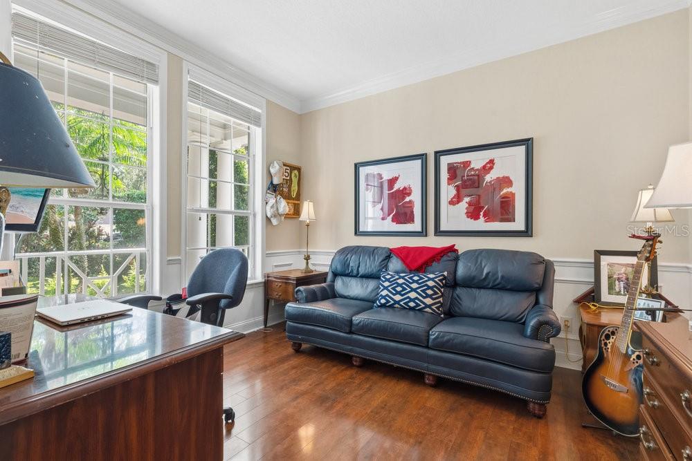 8375 Bowden Way Windermere, FL 34786 - Photo 38 of 62 a living room with furniture and a large window