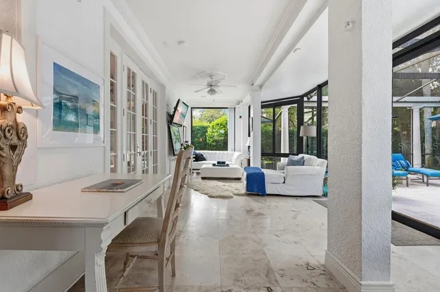 a view of a chairs and table in the patio