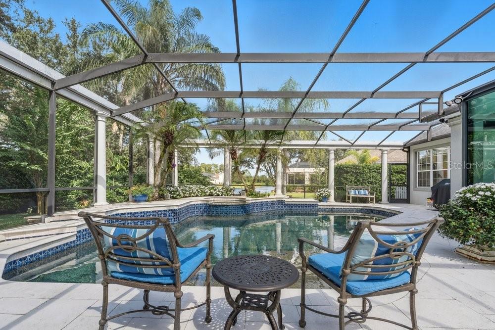 8375 Bowden Way Windermere, FL 34786 - Photo 48 of 62 a view of a chairs and table in the patio