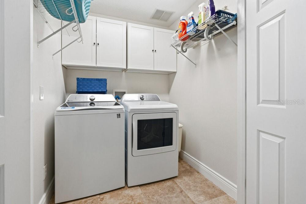 8375 Bowden Way Windermere, FL 34786 - Photo 60 of 62 a utility room with dryer and washer
