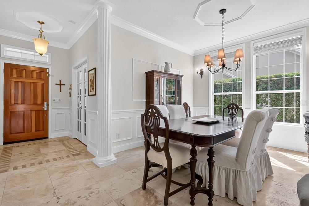 8375 Bowden Way Windermere, FL 34786 - Photo 6 of 62 a view of a dining room with furniture window and outside view