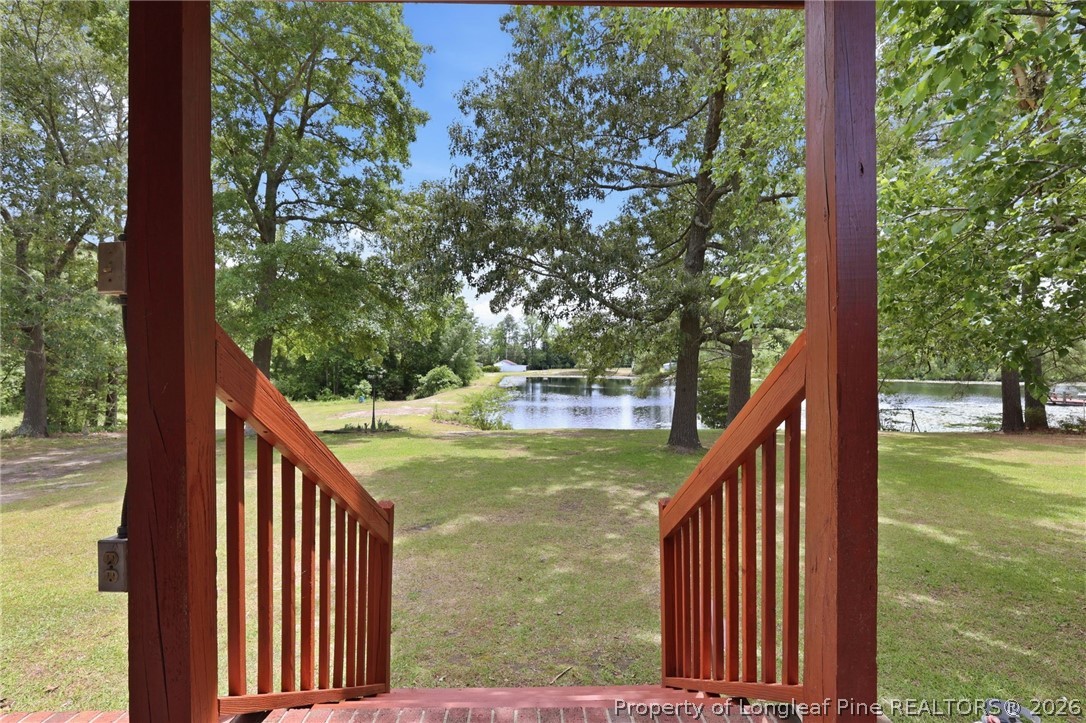 10400 Ruth Vinson Road Autryville, NC 28318 - Photo 21 of 49 a view of a balcony with an outdoor space
