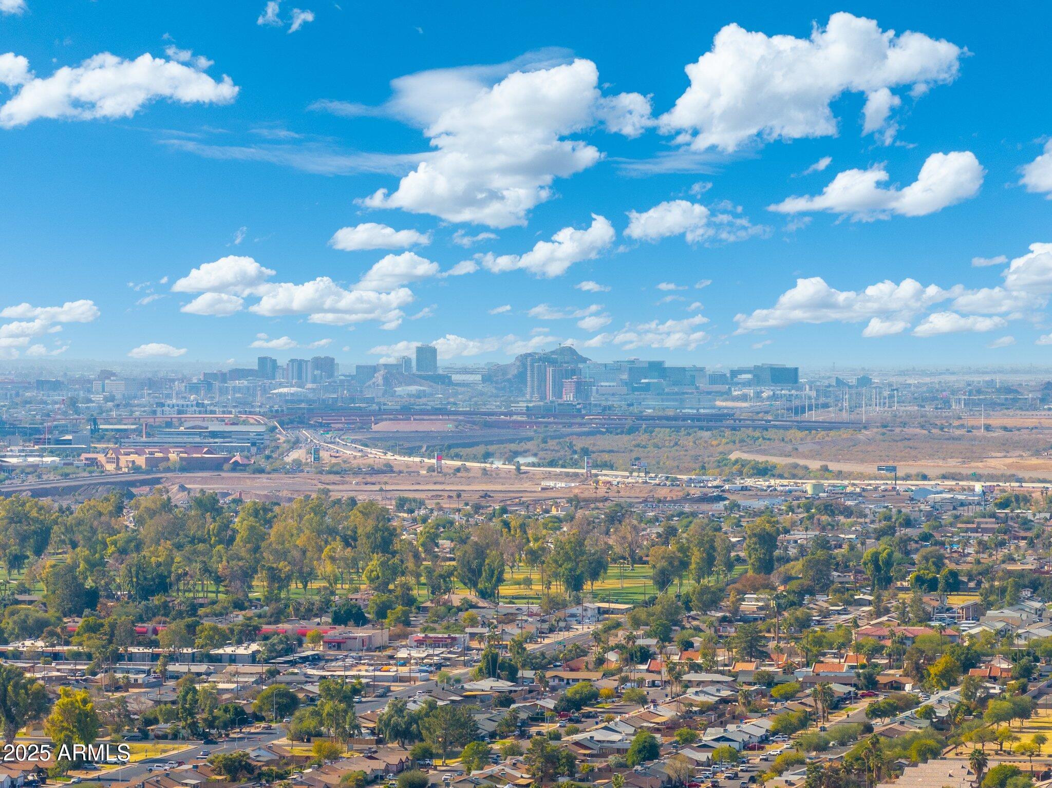 1759 North Spring Circle Mesa, AZ 85203 - Photo 2 of 69 a view of a city