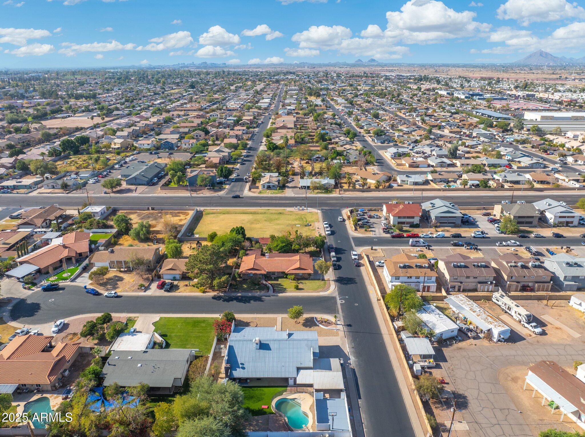 1759 North Spring Circle Mesa, AZ 85203 - Photo 3 of 69 an aerial view of a city