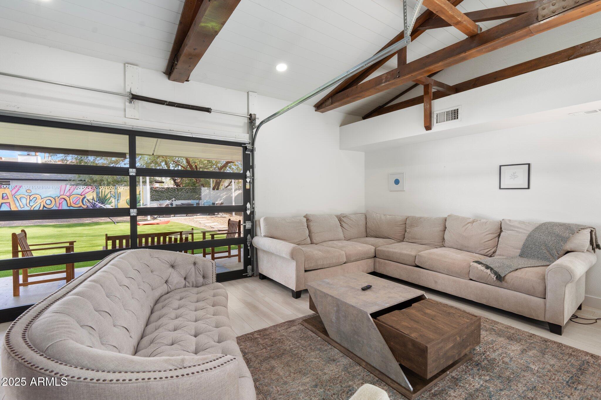 1759 North Spring Circle Mesa, AZ 85203 - Photo 57 of 69 a living room with furniture and window