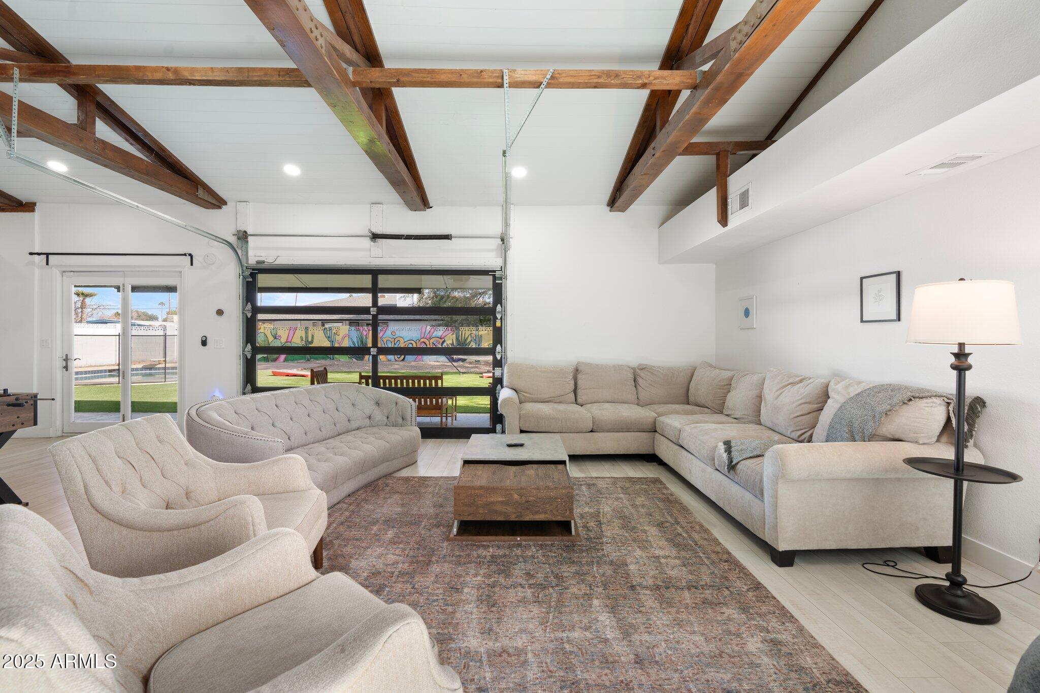 1759 North Spring Circle Mesa, AZ 85203 - Photo 59 of 69 a living room with furniture and a couch