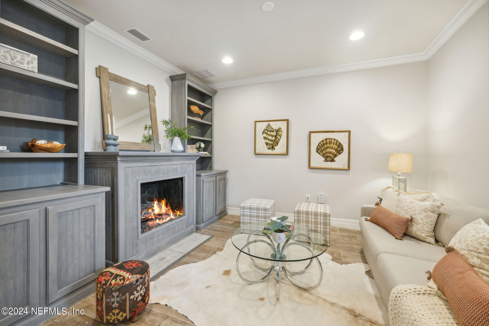 376 Eagle Pass Drive Ponte Vedra, FL 32081 - Photo 14 of 52 a living room with furniture and a fireplace