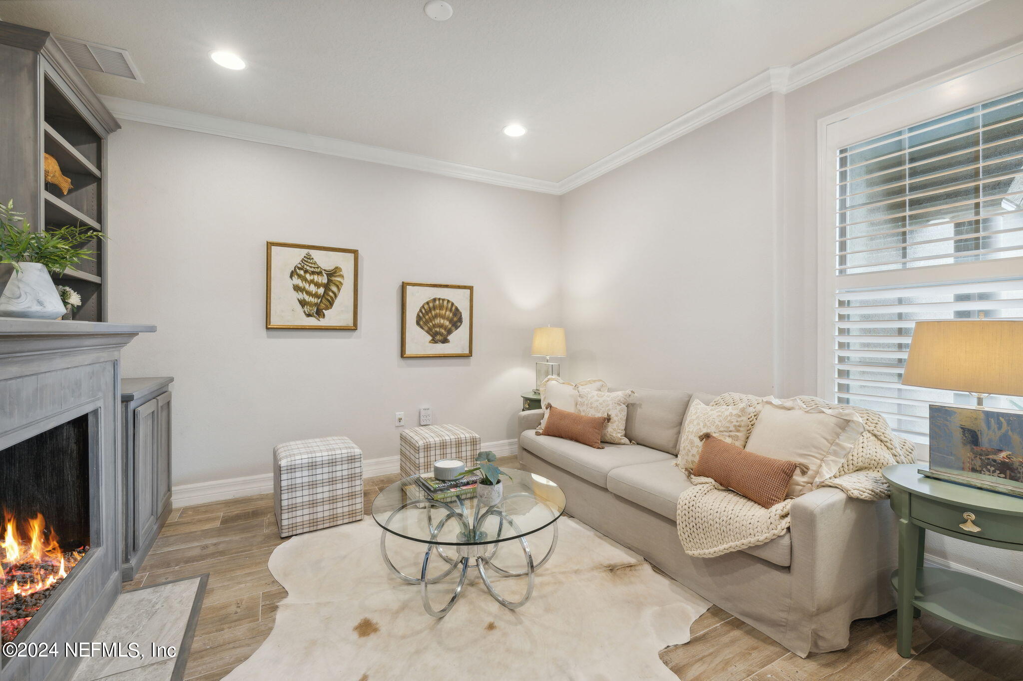 376 Eagle Pass Drive Ponte Vedra, FL 32081 - Photo 15 of 52 a living room with furniture and a fireplace